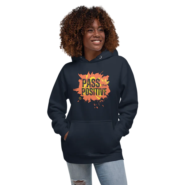 The Splash hoodie from Pass the Positive collection, bold paint-splatter design with an uplifting vibe