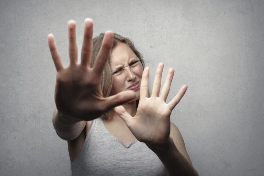 women stopping with her hands